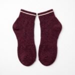 Burgundy ankle socks with white stripe and ribbed knit design