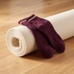 Burgundy ankle socks with white stripe and ribbed knit design