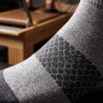 Gray ankle socks with black honeycomb pattern, reinforced heel and toe, and low-cut athletic design