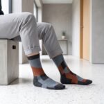 Lehvera merino wool hiking socks with black gray and orange geometric design