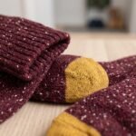 Lehvera merino wool hiking socks in burgundy with speckled knit and mustard heel and toe