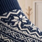 Lehvera merino wool hiking socks in navy and cream with Nordic snowflake pattern