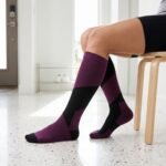 Men’s purple and black Merino Wool Compression Socks with geometric color-block design