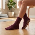 Maroon speckled Pilates socks with non-slip grip dots on the soles