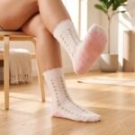 Floral Pilates socks with pink non-slip grip dots and scalloped cuff