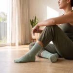 Sage green women’s crew grip socks with white non-slip sole grips